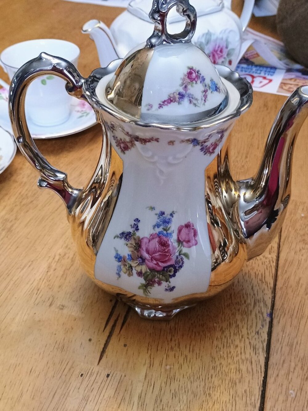 vintage porcelain teapot is likely of Bavarian origin